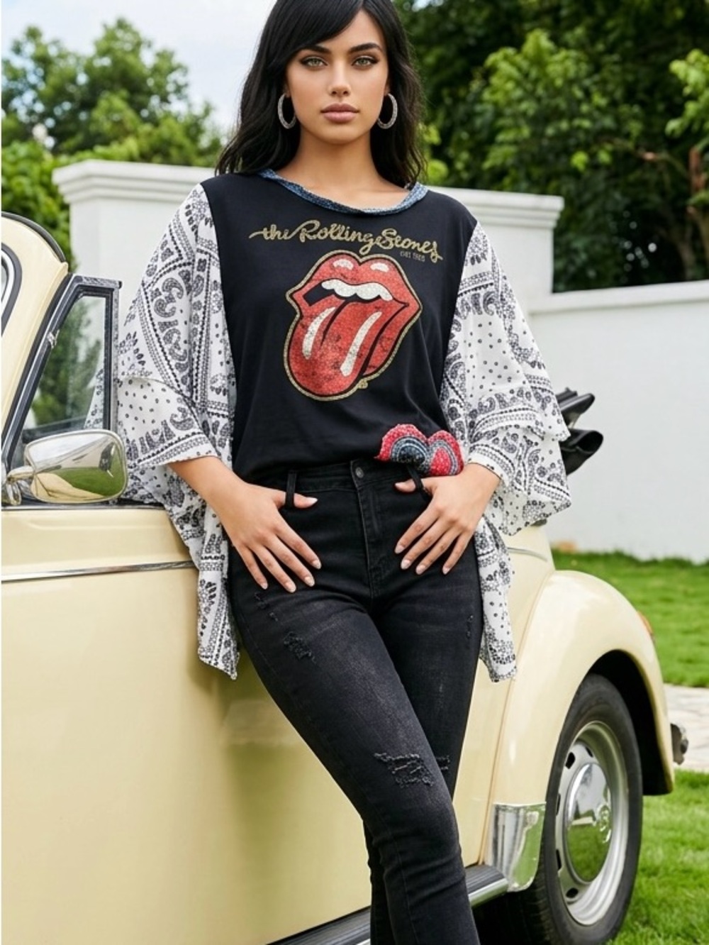 the Rolling Stones Black Tee with Red Tongue Graphic and White Paisley Overlay